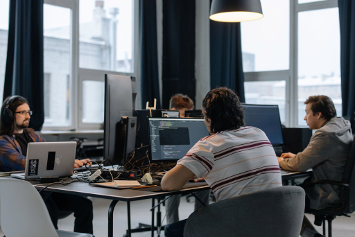 Software team working together in an office on development planning