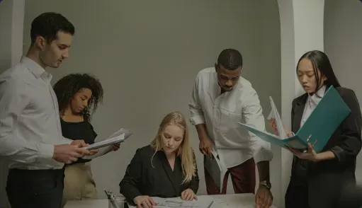 Business team planning when to build custom software for a strategic workflow