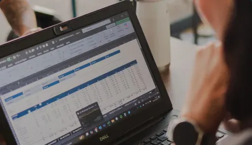 Business team reviewing spreadsheet process risk and operational handoffs